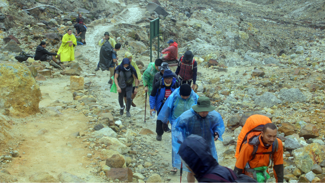 Environmental Action – DOAT Members Collecting Trash at Pondok Seladah